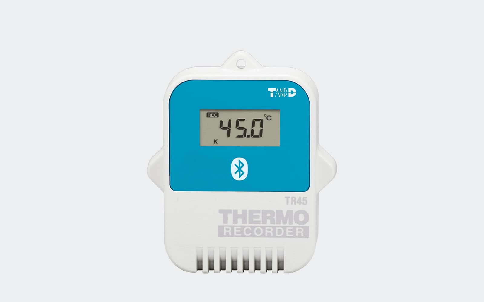 Registrador de temperatura T&D TR45 con conectividad Bluetooth, pantalla digital y diseño compacto para monitorización continua en entornos industriales y logísticos sobre fondo gris claro